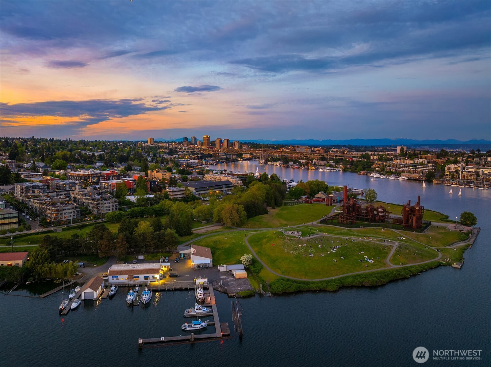 1730 North Northlake Way, Unit 415 Seattle, WA 98103 - Photo 33 of 40 an aerial view of a house with a garden and lake view
