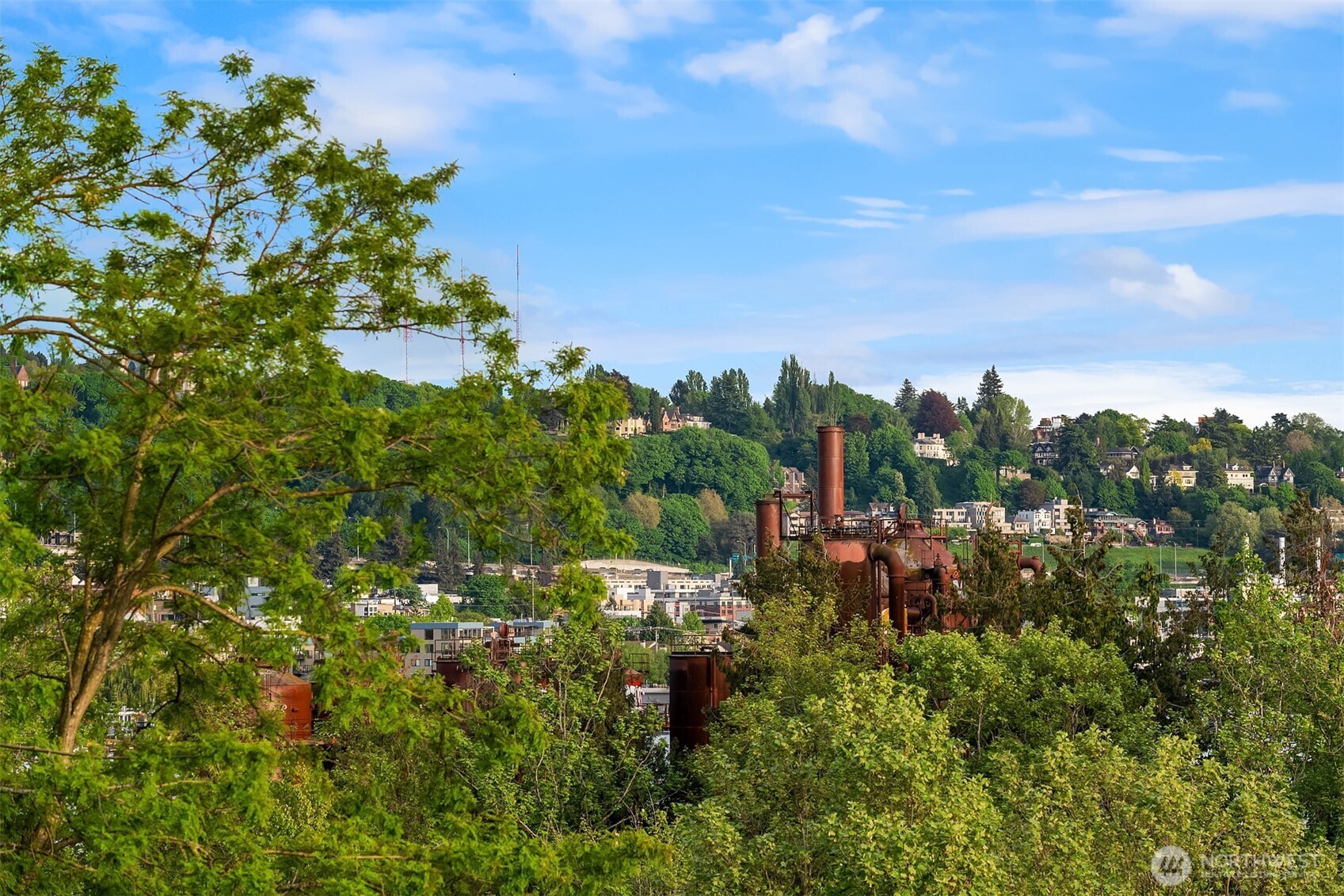 1730 North Northlake Way, Unit 415 Seattle, WA 98103 - Photo 39 of 40 a view of a city with lush green forest