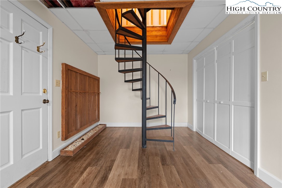 131 Hemlock Road Banner Elk, NC 28604 - Photo 21 of 37 a view of an entryway with wooden floor