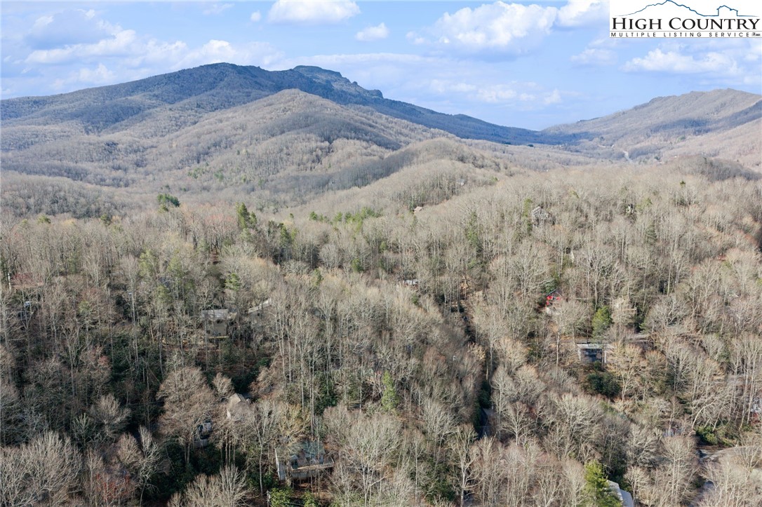 131 Hemlock Road Banner Elk, NC 28604 - Photo 32 of 37 a view of mountain with sunset