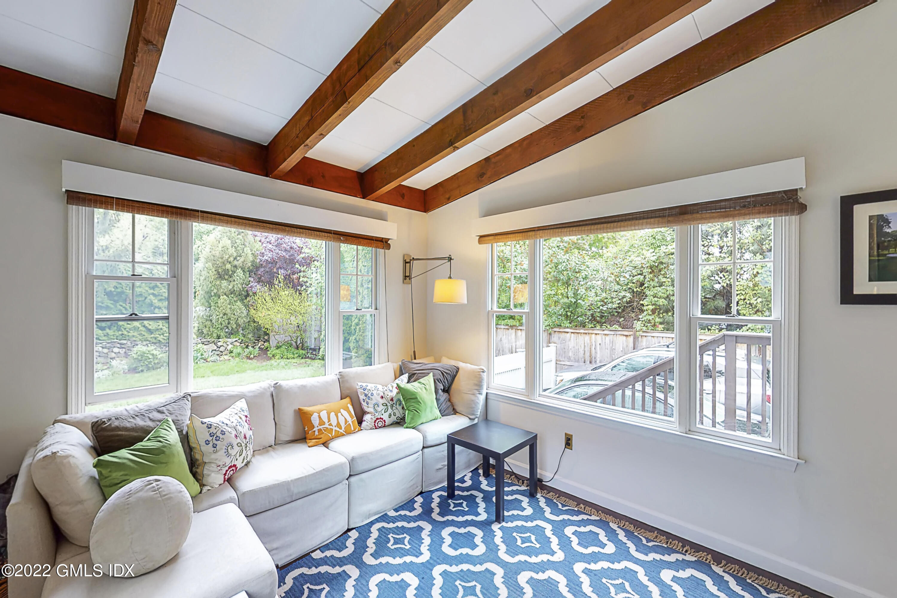8 Hassake Road Old Greenwich, CT 06870 - Photo 15 of 37 TV room w/ view to back steps & driveway