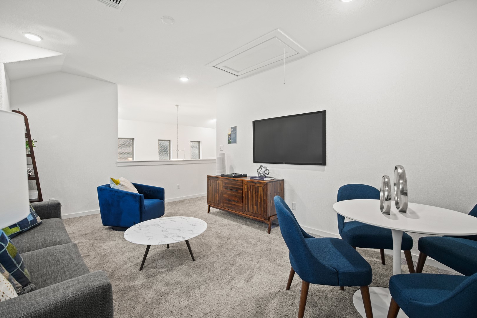 190 Hornet Street Elgin, TX 78621 - Photo 30 of 40 a living room with furniture and a flat screen tv