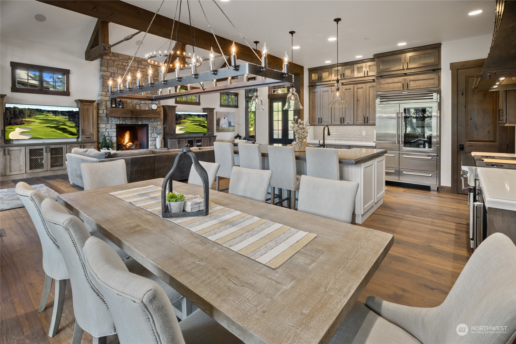 351 Maple Leaf Loop Cle Elum, WA 98922 - Photo 14 of 40 a living room with stainless steel appliances furniture a fireplace and a kitchen view