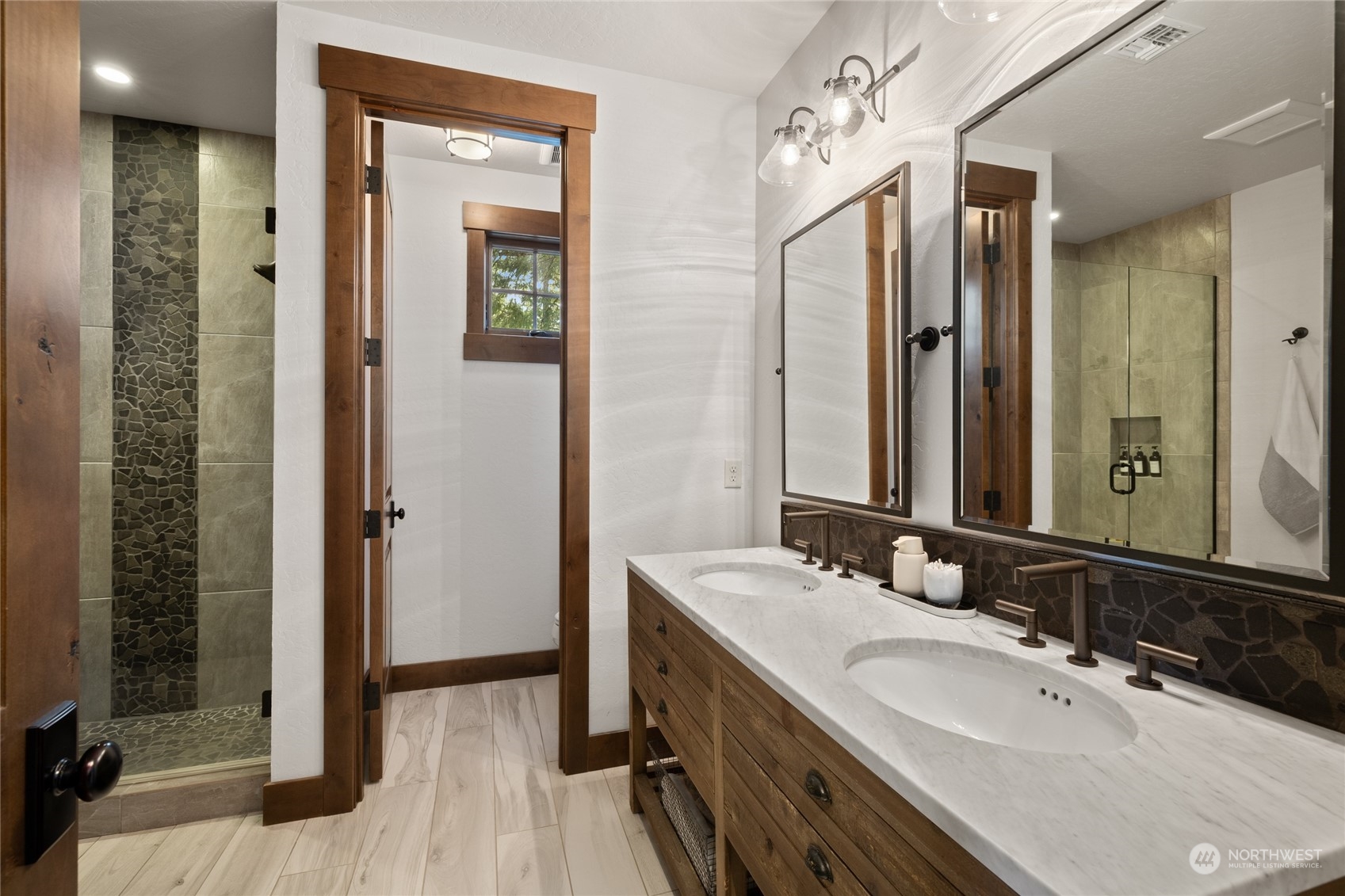 351 Maple Leaf Loop Cle Elum, WA 98922 - Photo 25 of 40 a bathroom with a double vanity sink and a mirror