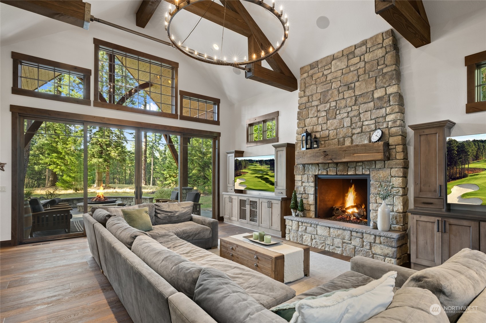 351 Maple Leaf Loop Cle Elum, WA 98922 - Photo 5 of 40 a living room with furniture a flat screen tv and a fireplace