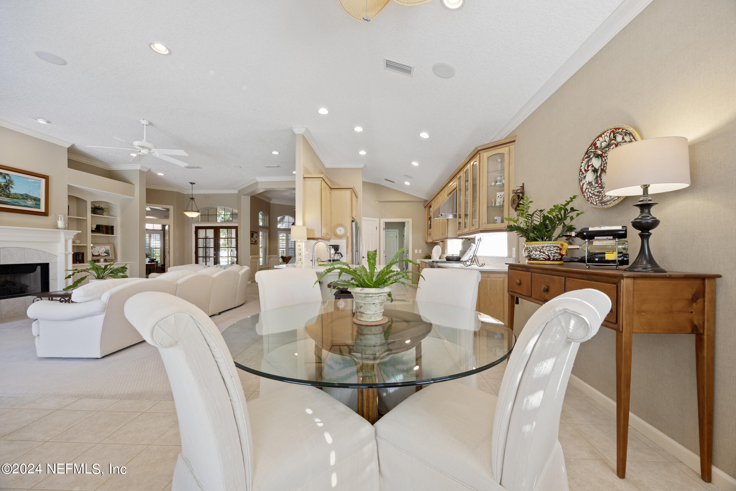 348 Fiddlers Point Drive St. Augustine, FL 32080 - Photo 11 of 58 a view of a dining room with furniture