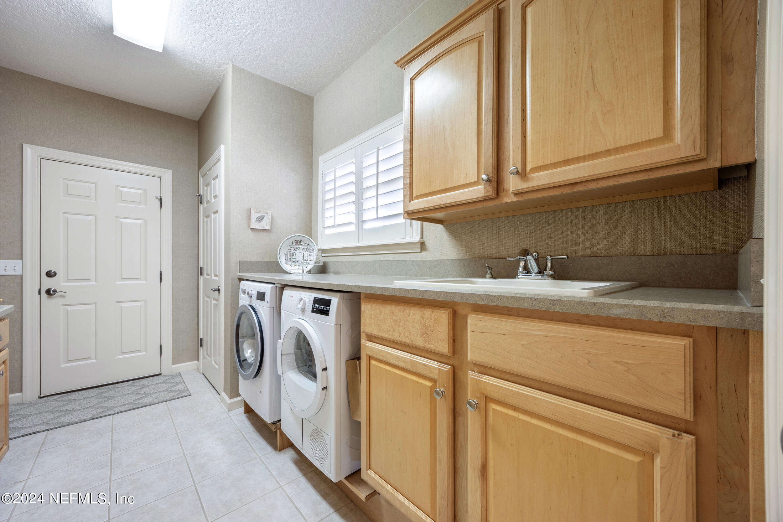 348 Fiddlers Point Drive St. Augustine, FL 32080 - Photo 19 of 58 laundry room