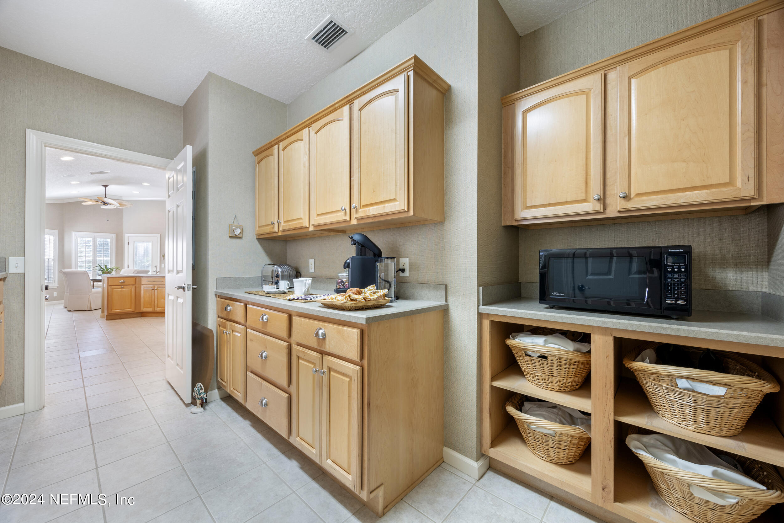 348 Fiddlers Point Drive St. Augustine, FL 32080 - Photo 20 of 58 a kitchen with stainless steel appliances granite countertop a stove and a sink