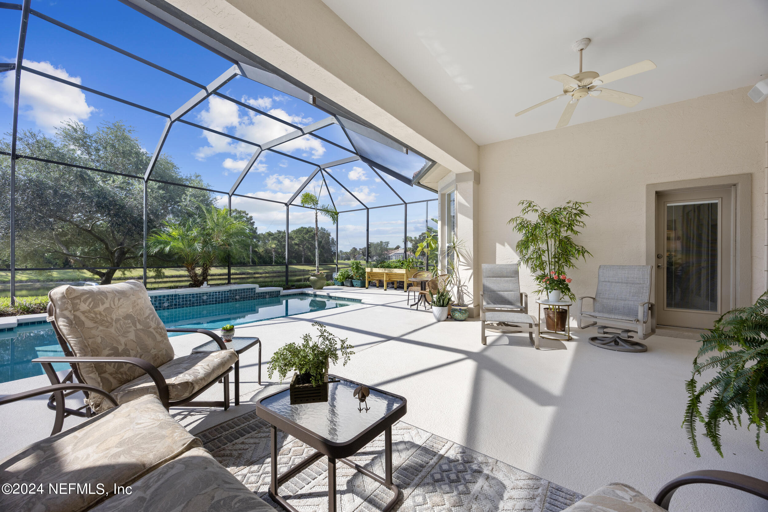 348 Fiddlers Point Drive St. Augustine, FL 32080 - Photo 33 of 58 a building outdoor space with patio furniture and potted plants