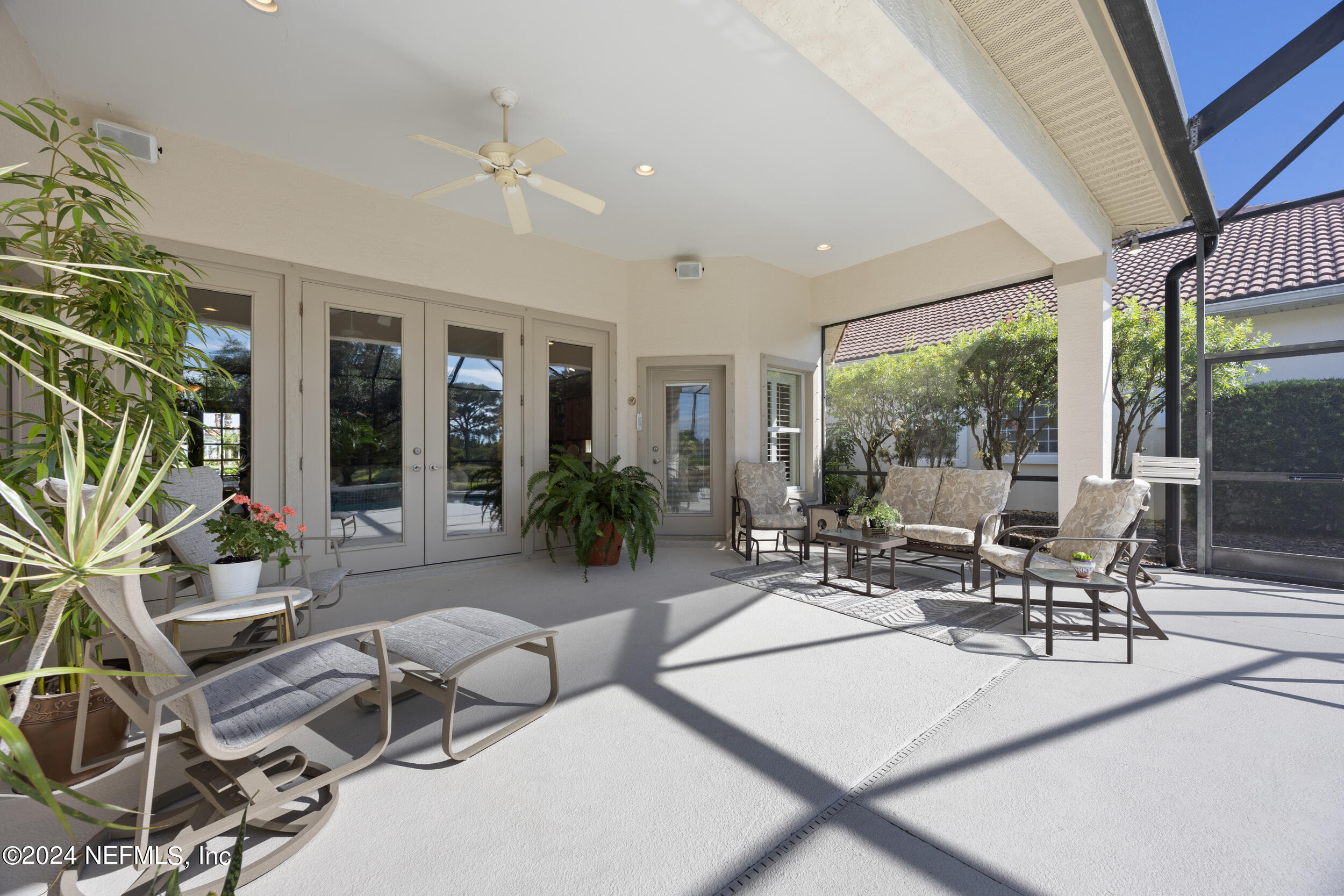 348 Fiddlers Point Drive St. Augustine, FL 32080 - Photo 34 of 58 a building outdoor space with patio furniture and potted plants