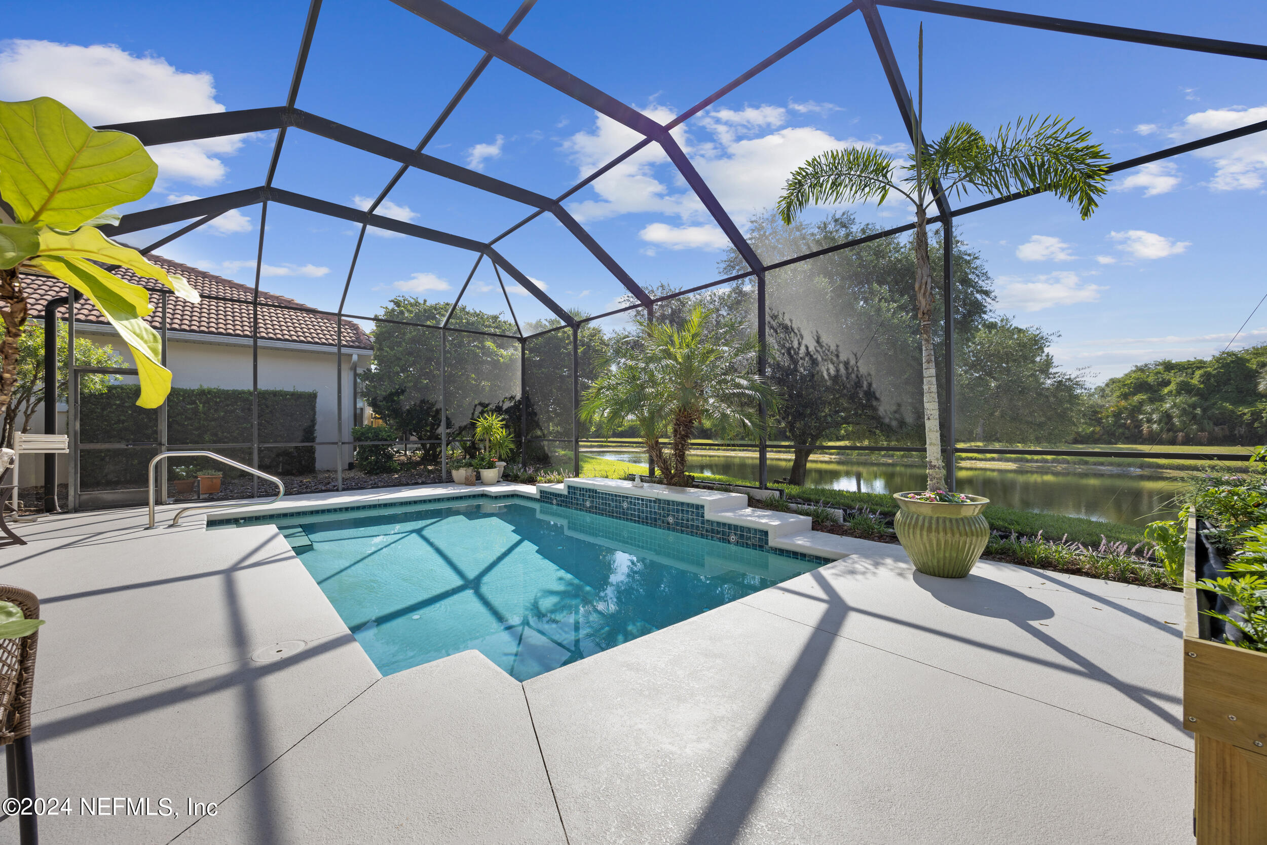 348 Fiddlers Point Drive St. Augustine, FL 32080 - Photo 35 of 58 a view of a backyard with sitting area