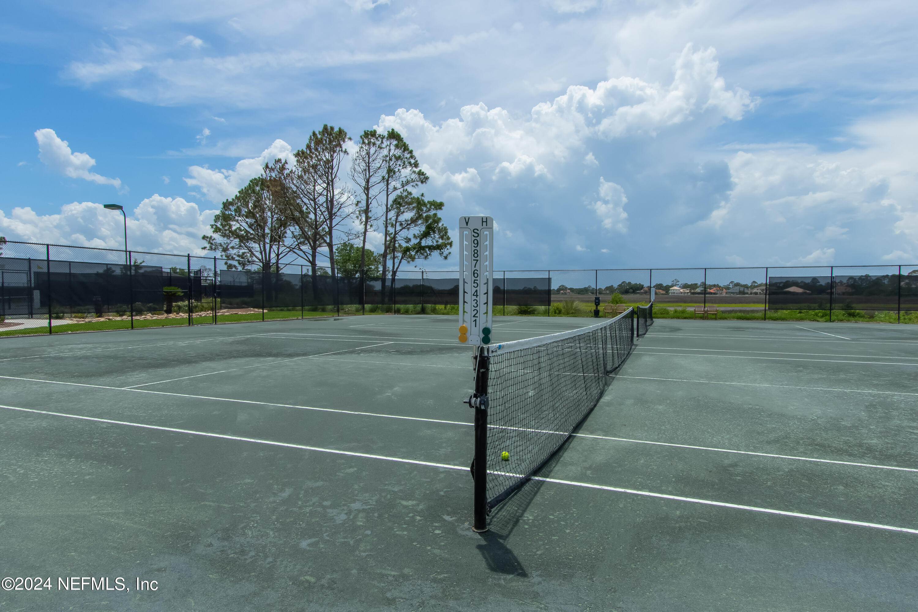348 Fiddlers Point Drive St. Augustine, FL 32080 - Photo 57 of 58 a view of an outdoor space and tennis court