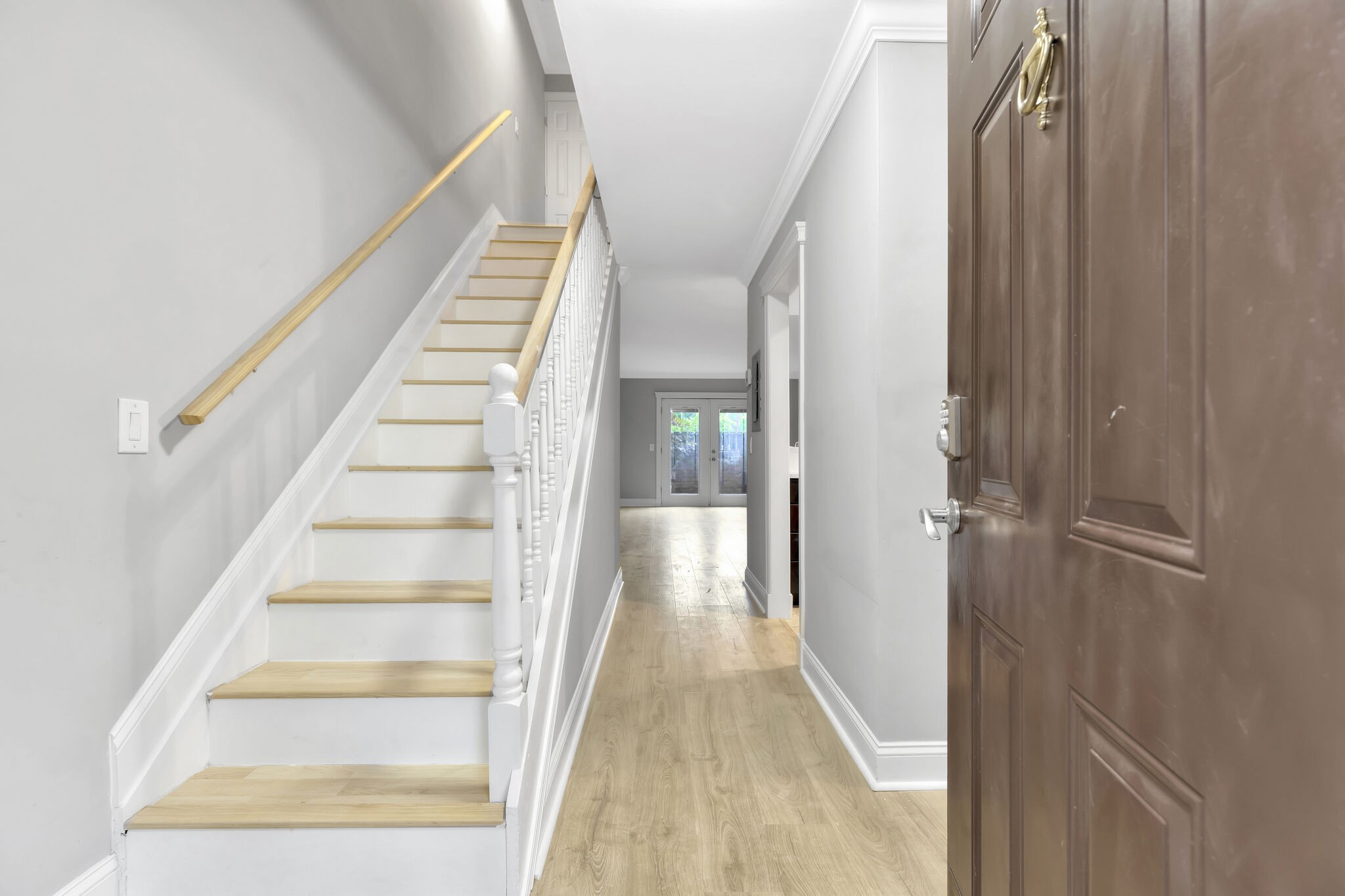 2116 Hobbs Road, Unit A7 Nashville, TN 37215 - Photo 3 of 12 a view of a hallway with wooden floor and entryway