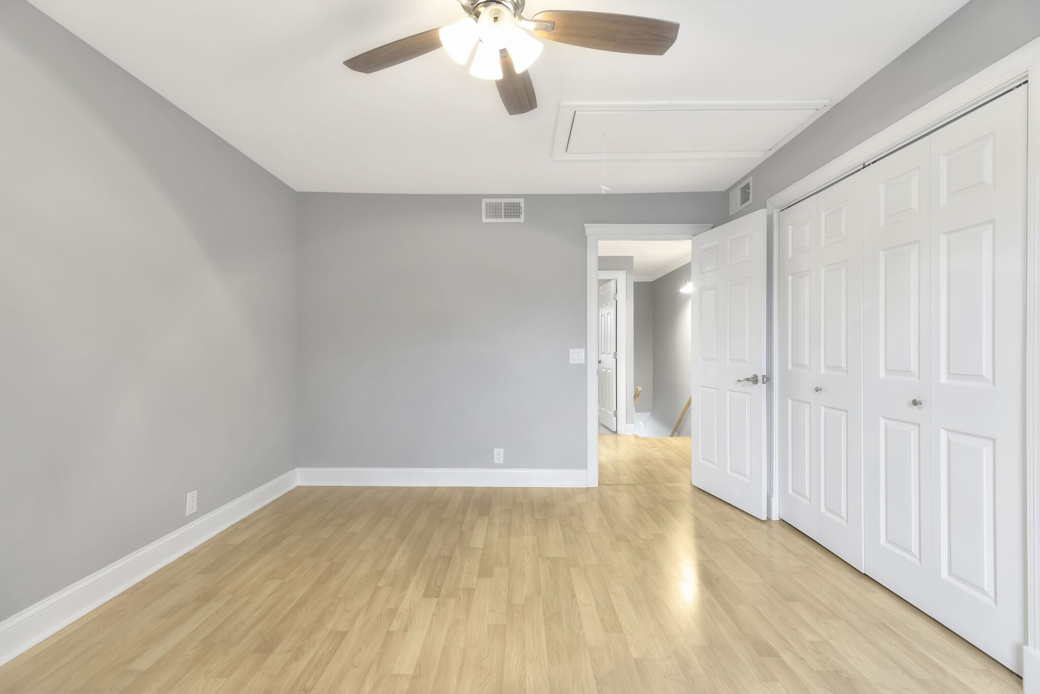 2116 Hobbs Road, Unit A7 Nashville, TN 37215 - Photo 8 of 12 a view of an empty room with wooden floor