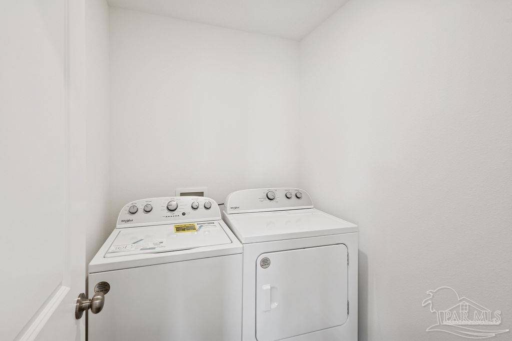 3422 Shell Road Jay, FL 32565 - Photo 13 of 31 a utility room with dryer and washer