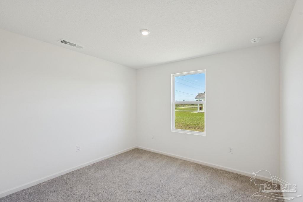 3422 Shell Road Jay, FL 32565 - Photo 14 of 31 an empty room with a window
