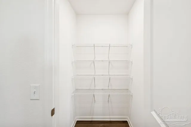 a view of a room with rack on the wall