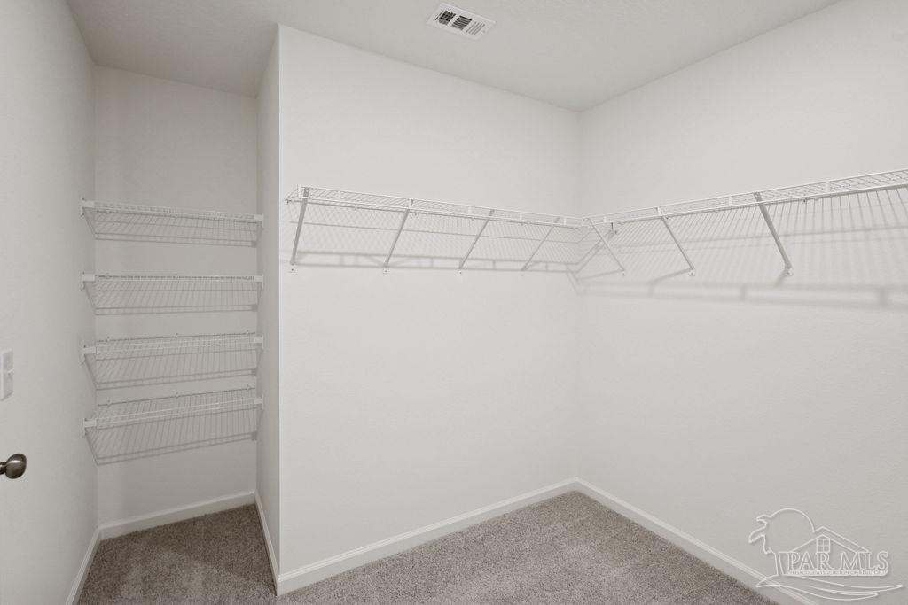 3422 Shell Road Jay, FL 32565 - Photo 28 of 31 a view of a room with racks on the wall