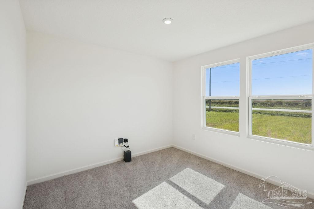 3422 Shell Road Jay, FL 32565 - Photo 8 of 31 a view of an empty room with a window