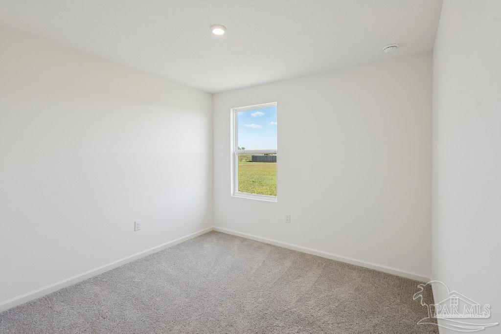 3422 Shell Road Jay, FL 32565 - Photo 10 of 31 a view of an empty room with a window