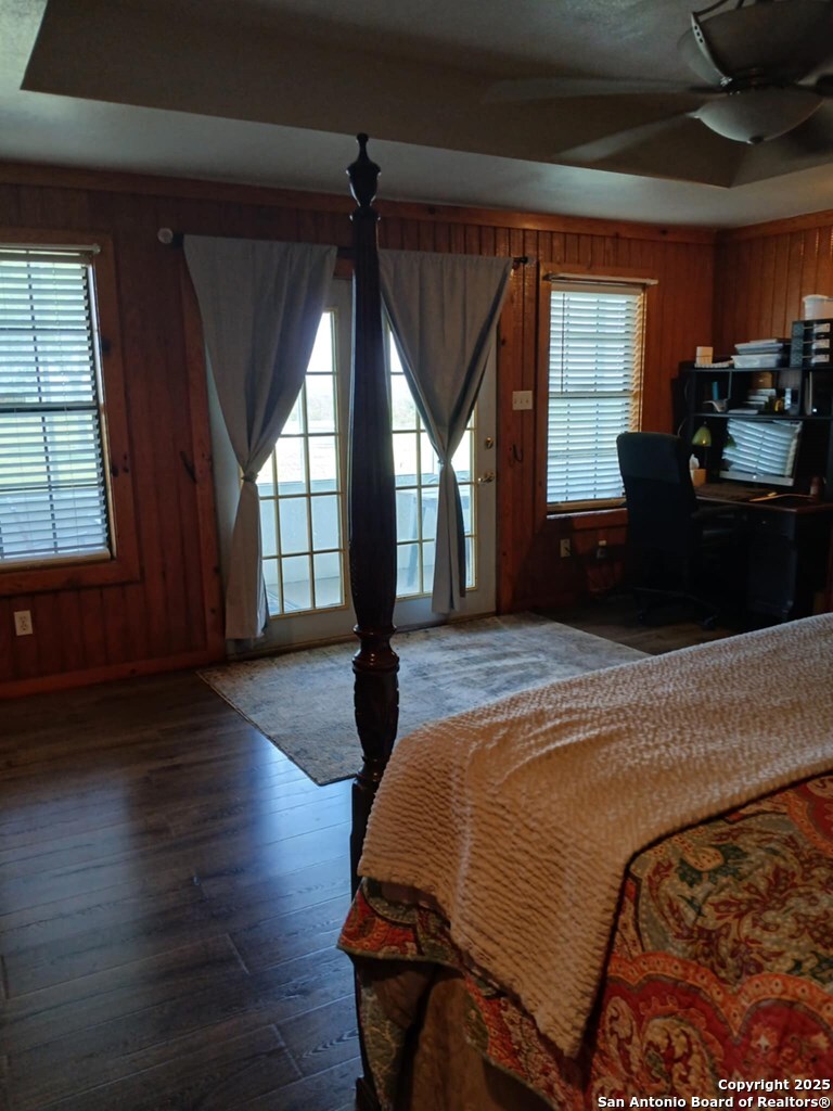 1121 Colony Road Beeville, TX 78102 - Photo 17 of 19 a bedroom with a bed and a large window