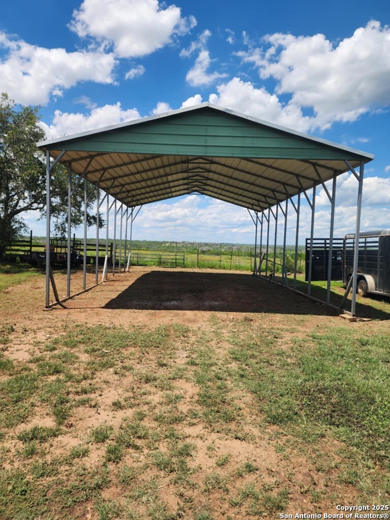 1121 Colony Road Beeville, TX 78102 - Photo 6 of 19 a view of a swimming pool with a patio