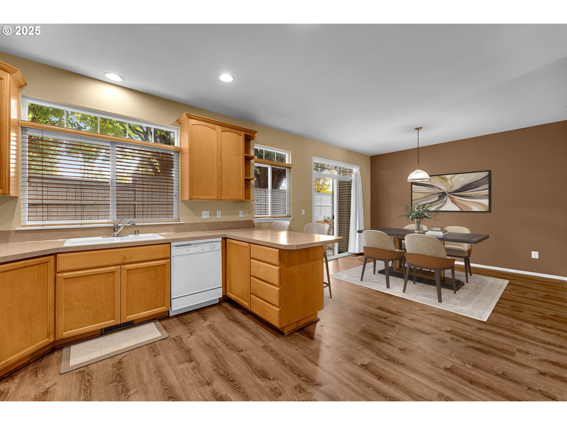 19509 Southeast 33rd Street Camas, WA 98607 - Photo 12 of 37 a kitchen with sink cabinets and wooden floor