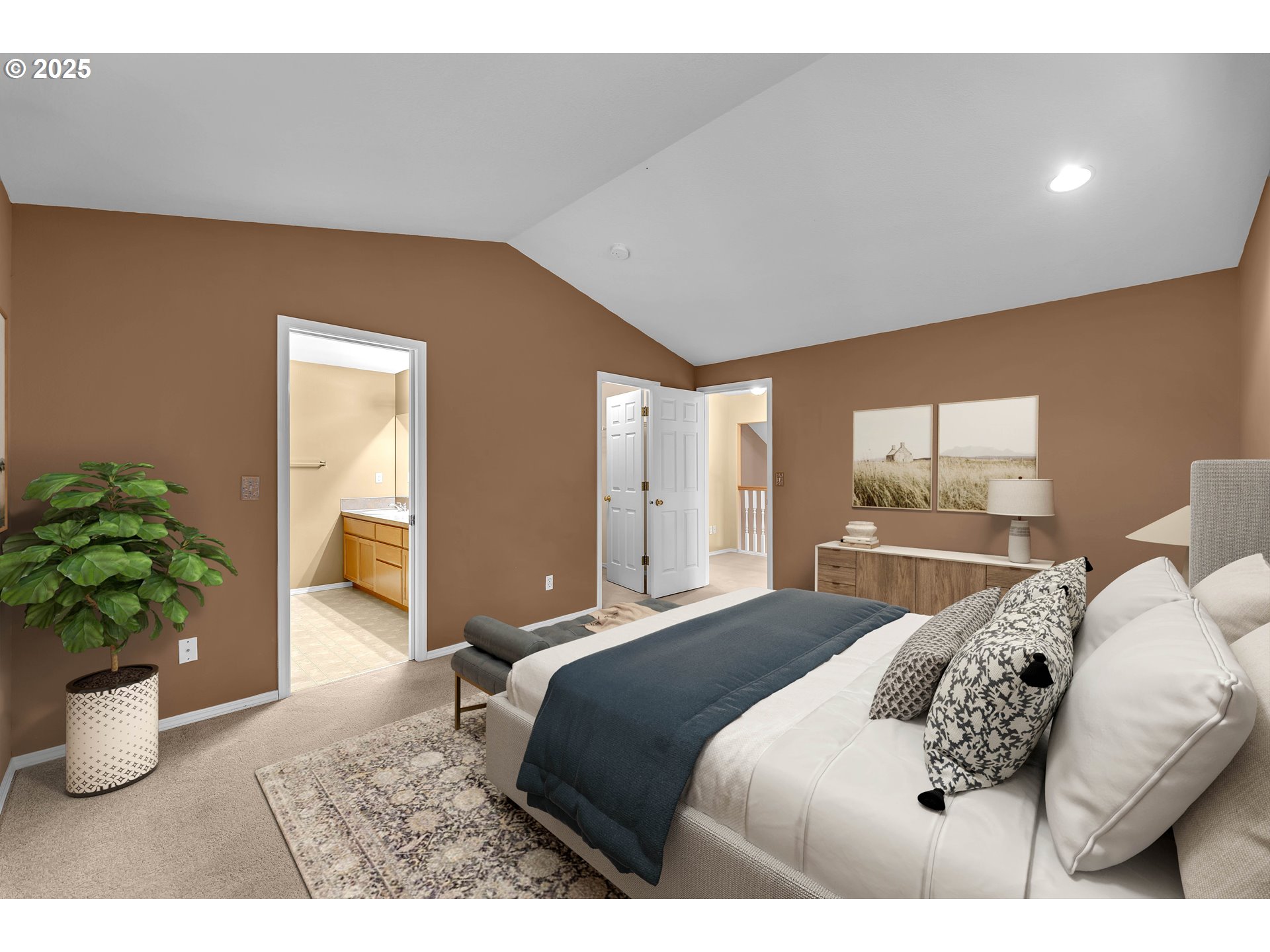 19509 Southeast 33rd Street Camas, WA 98607 - Photo 19 of 37 a bedroom with a bed and a potted plant