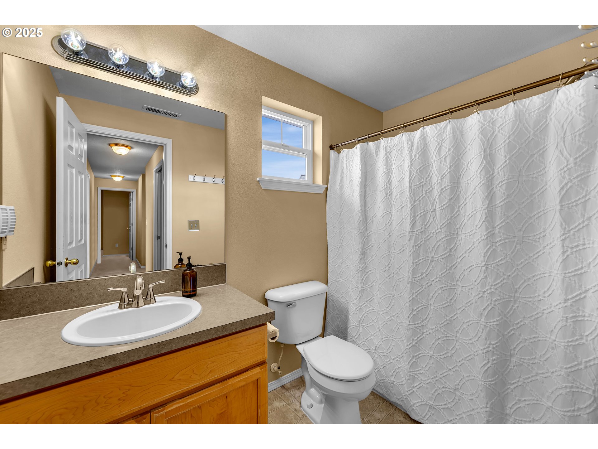19509 Southeast 33rd Street Camas, WA 98607 - Photo 27 of 37 a bathroom with a sink and a mirror