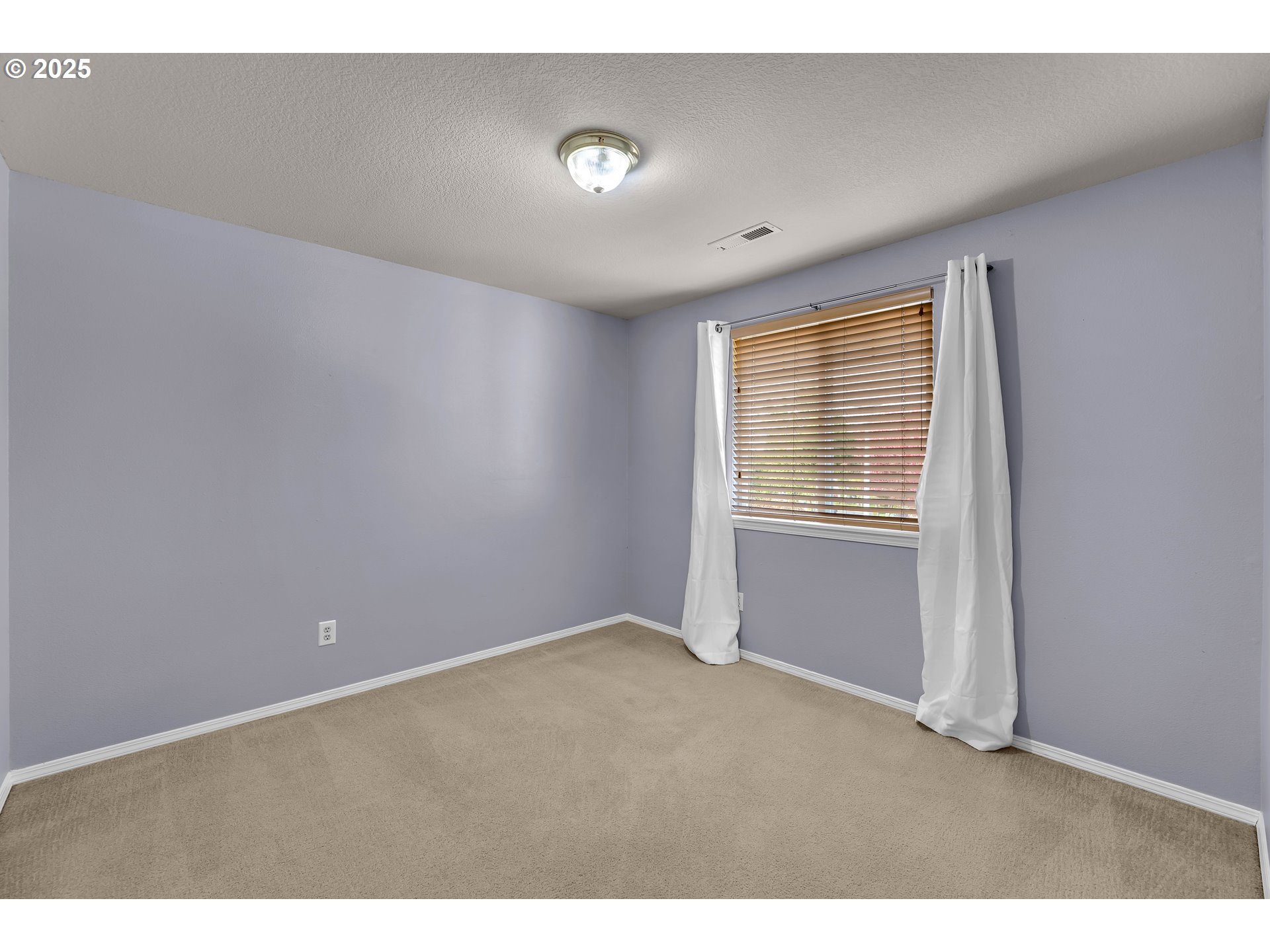 19509 Southeast 33rd Street Camas, WA 98607 - Photo 28 of 37 a view of an empty room with a window