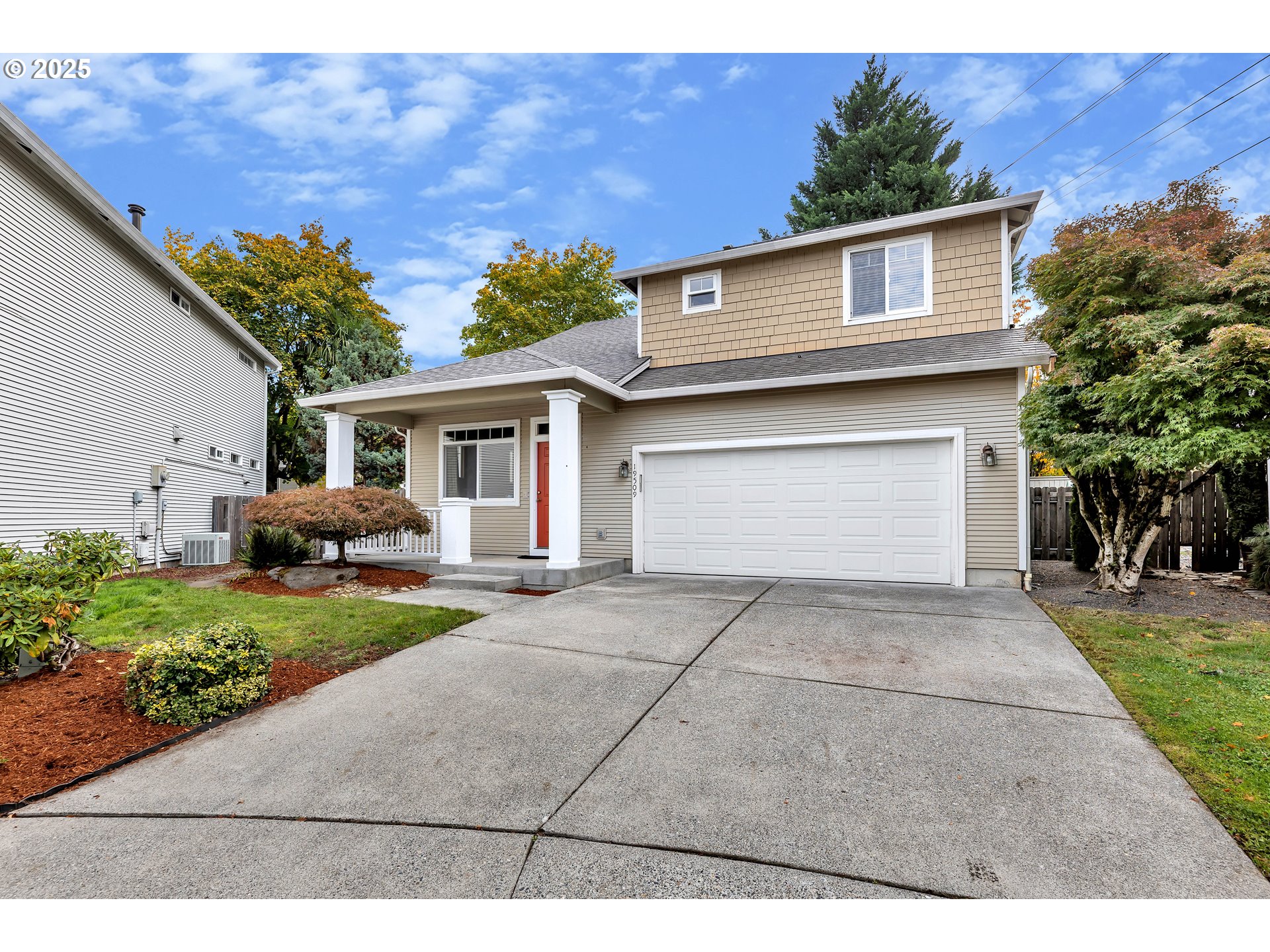 19509 Southeast 33rd Street Camas, WA 98607 - Photo 3 of 37 a front view of house with yard and green space