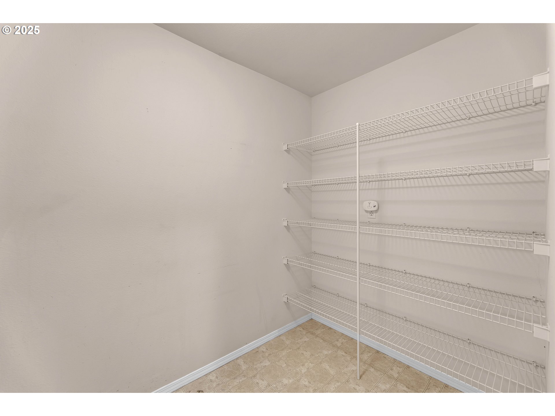 19509 Southeast 33rd Street Camas, WA 98607 - Photo 31 of 37 a view of small space with racks on the wall