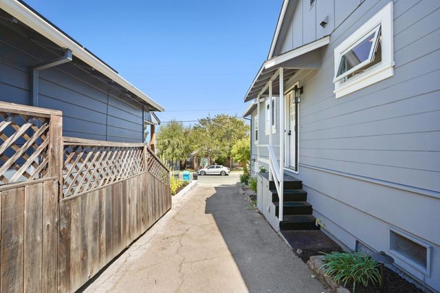 a view of a house with a street