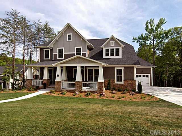 803 Harvest Pointe Drive Fort Mill, SC 29708 - Photo 1 of 16 a front view of a house with a yard