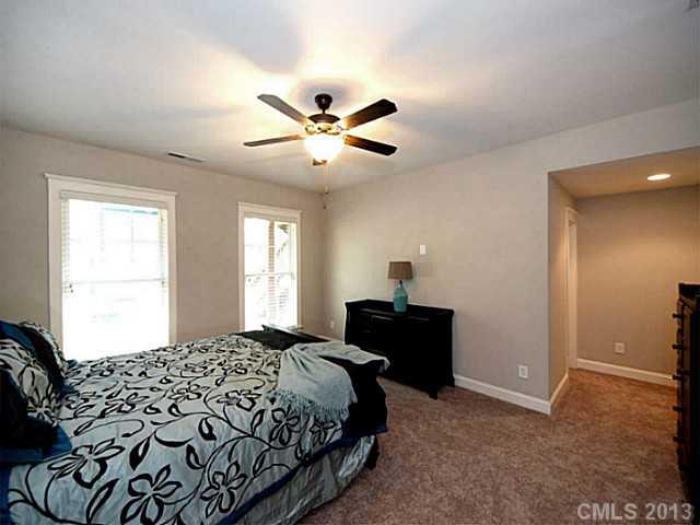 803 Harvest Pointe Drive Fort Mill, SC 29708 - Photo 12 of 16 a bedroom with a bed and a window