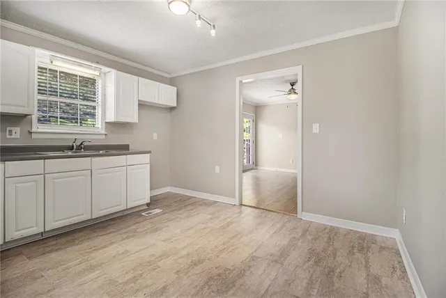 a view of a kitchen with a sink