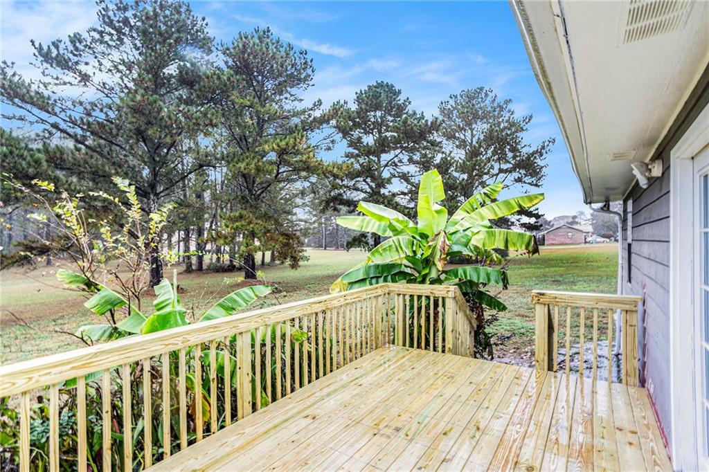 150 Dub Walker Road Jackson, GA 30233 - Photo 29 of 32 a view of balcony and wooden floor