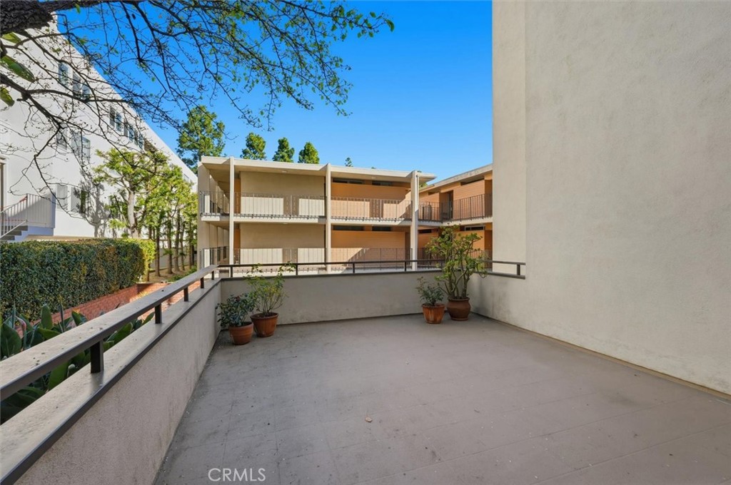 5658 Ravenspur Drive, Unit 208 Rancho Palos Verdes, CA 90275 - Photo 50 of 58 Community deck for pool parties (just steps from unit)