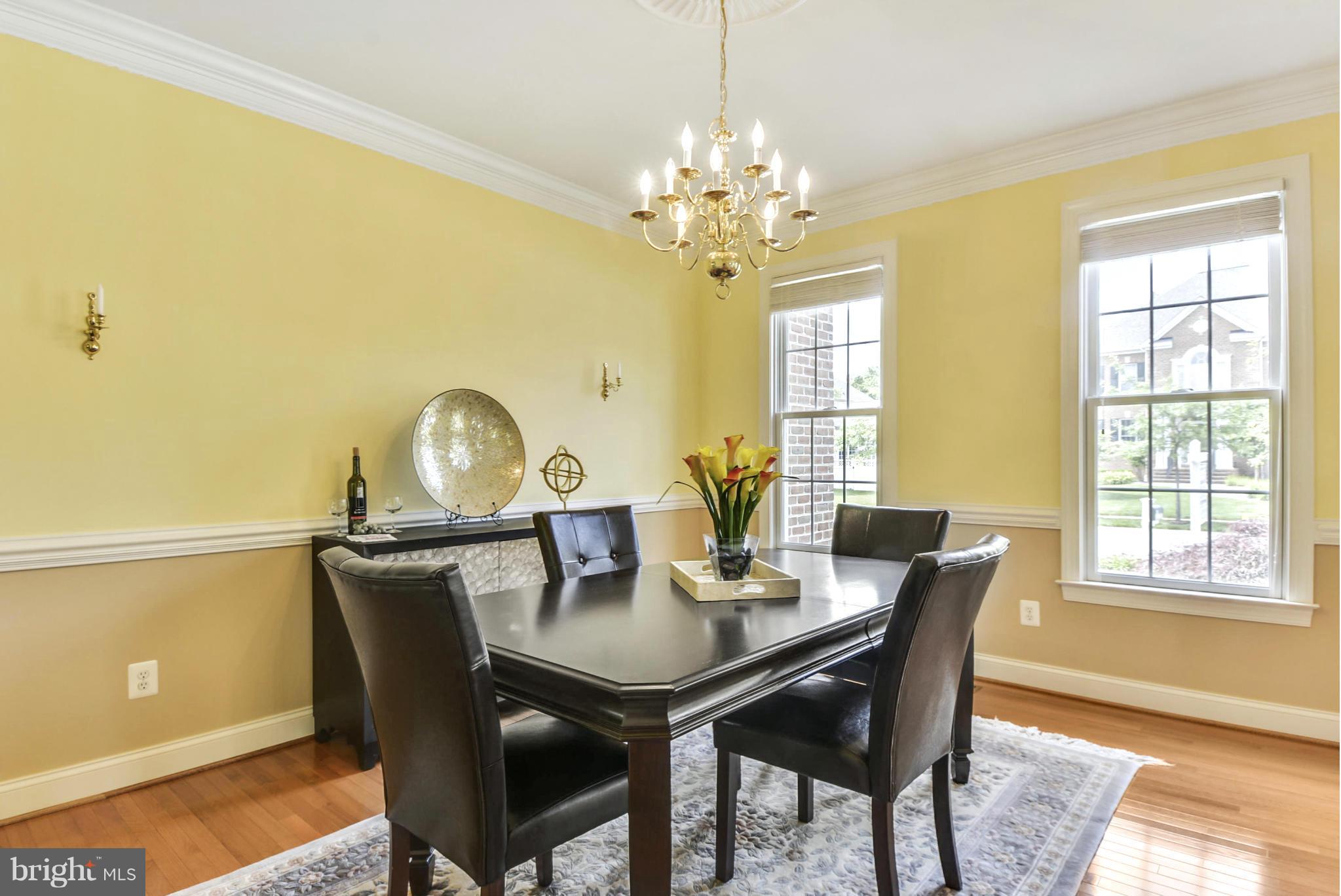 505 Tremont Circle Annapolis, MD 21409 - Photo 13 of 30 a view of a dining room with furniture and chandelier
