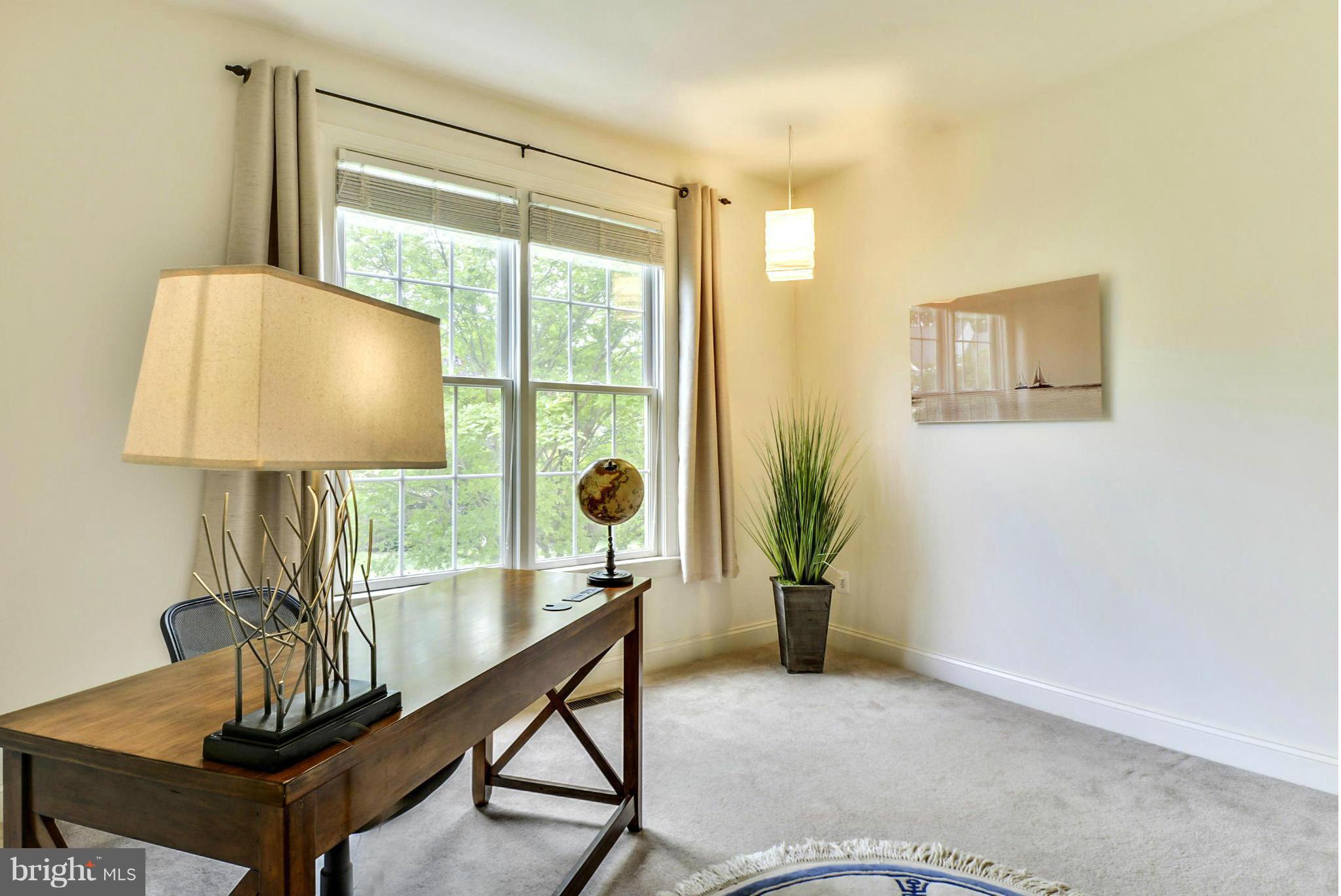 505 Tremont Circle Annapolis, MD 21409 - Photo 14 of 30 a living room with furniture and a large window