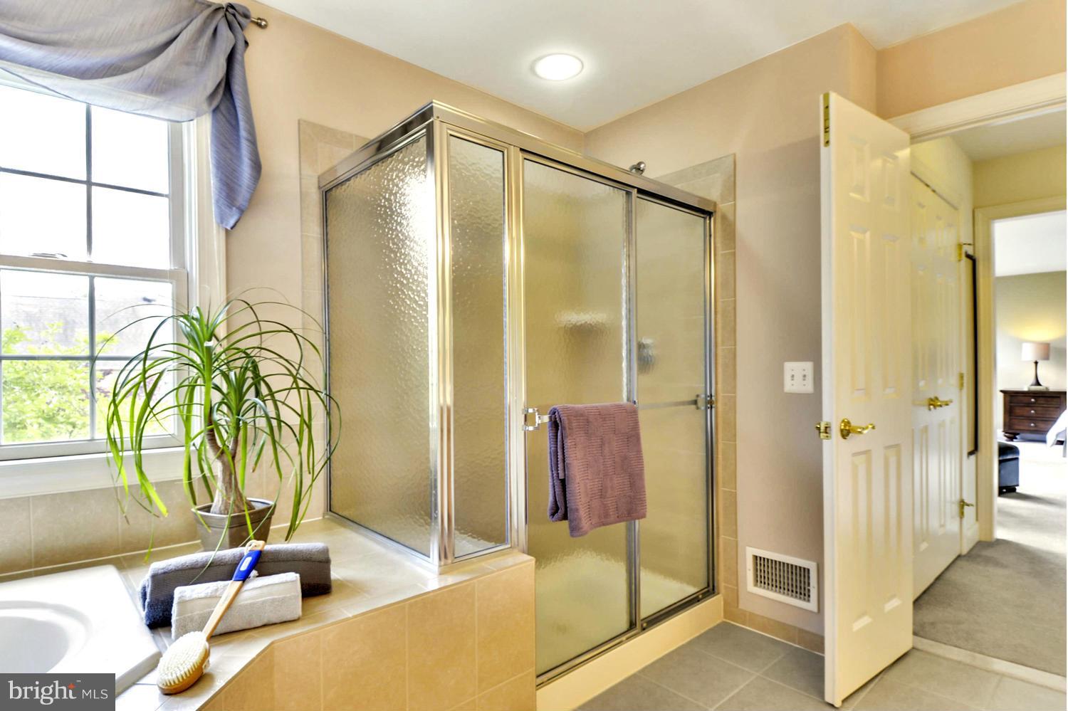 505 Tremont Circle Annapolis, MD 21409 - Photo 26 of 30 a bathroom with a tub and shower