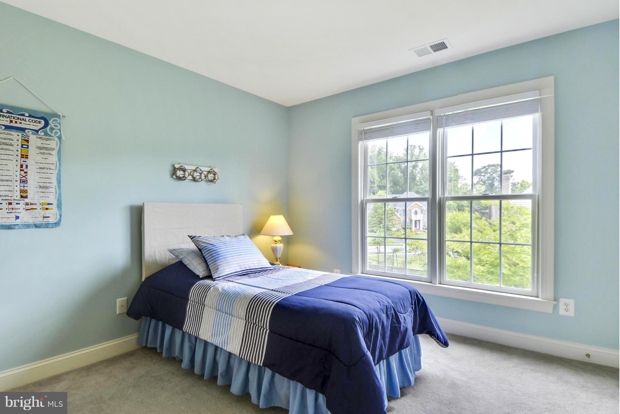 505 Tremont Circle Annapolis, MD 21409 - Photo 28 of 30 a bedroom with a bed and a window