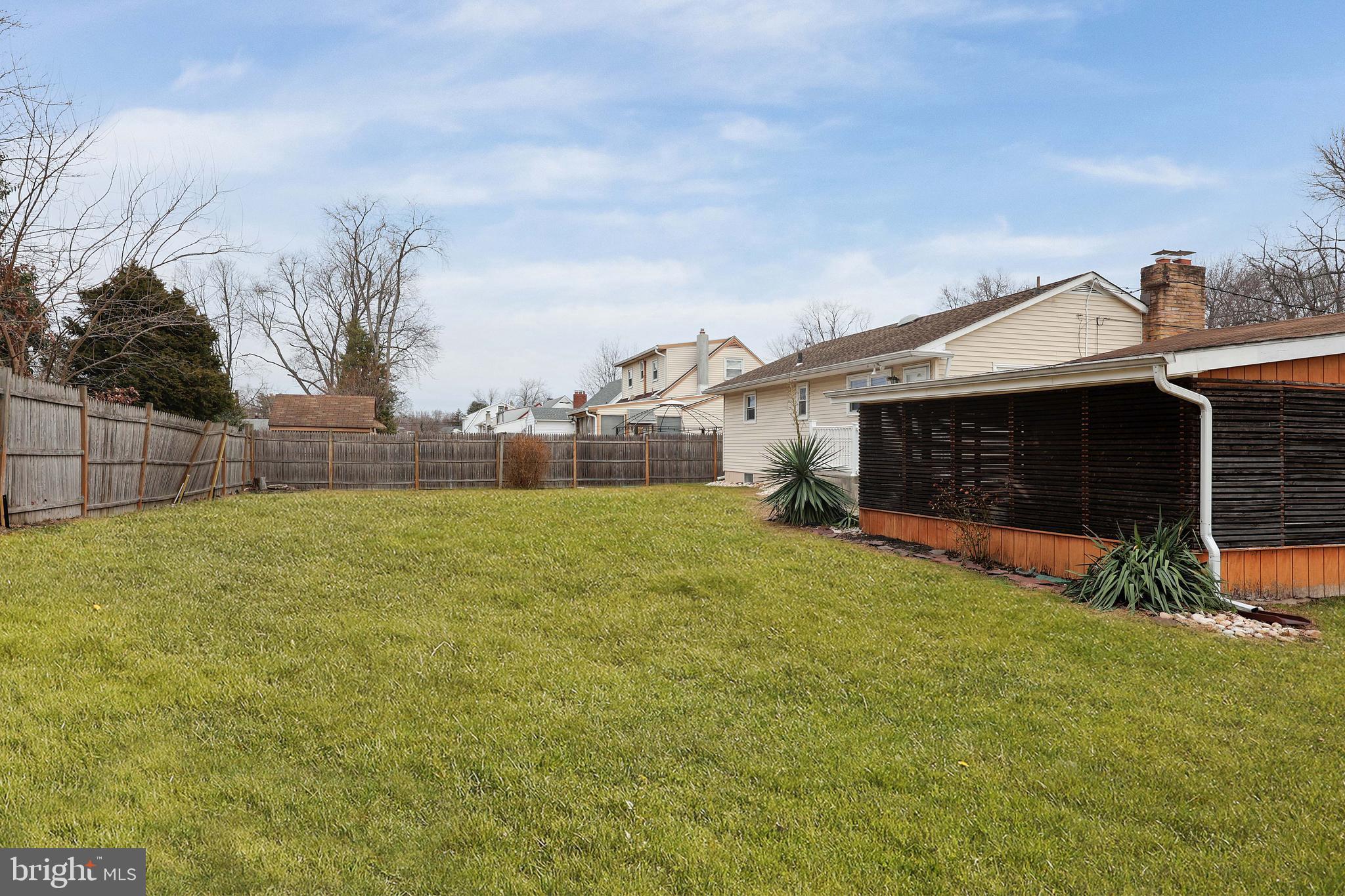 105 Kentucky Avenue Hamilton, NJ 08619 - Photo 26 of 29 a view of a house with a yard