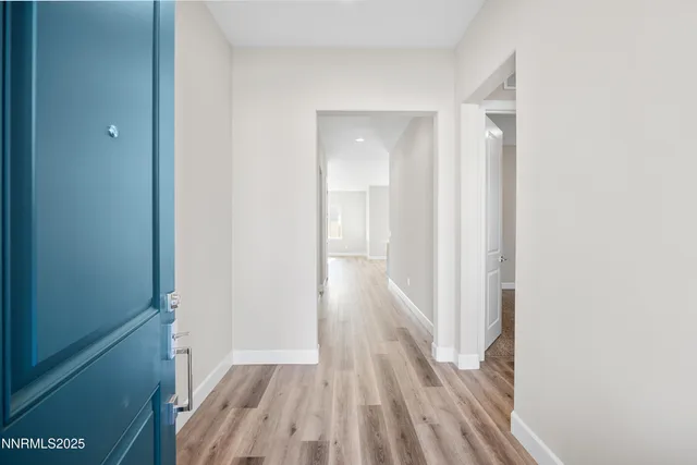a kitchen with a sink a stove and refrigerator