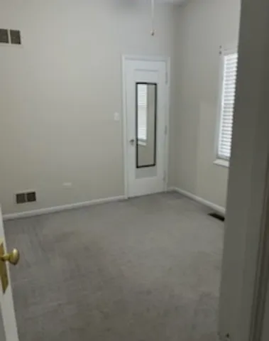 a bathroom with a toilet and a sink