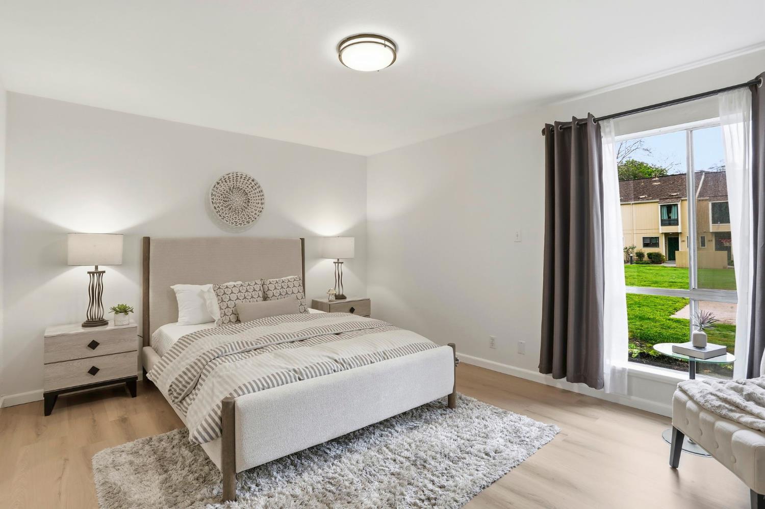 9005 Alcosta Boulevard, Unit 215 San Ramon, CA 94583 - Photo 4 of 30 a bedroom with a bed and a window