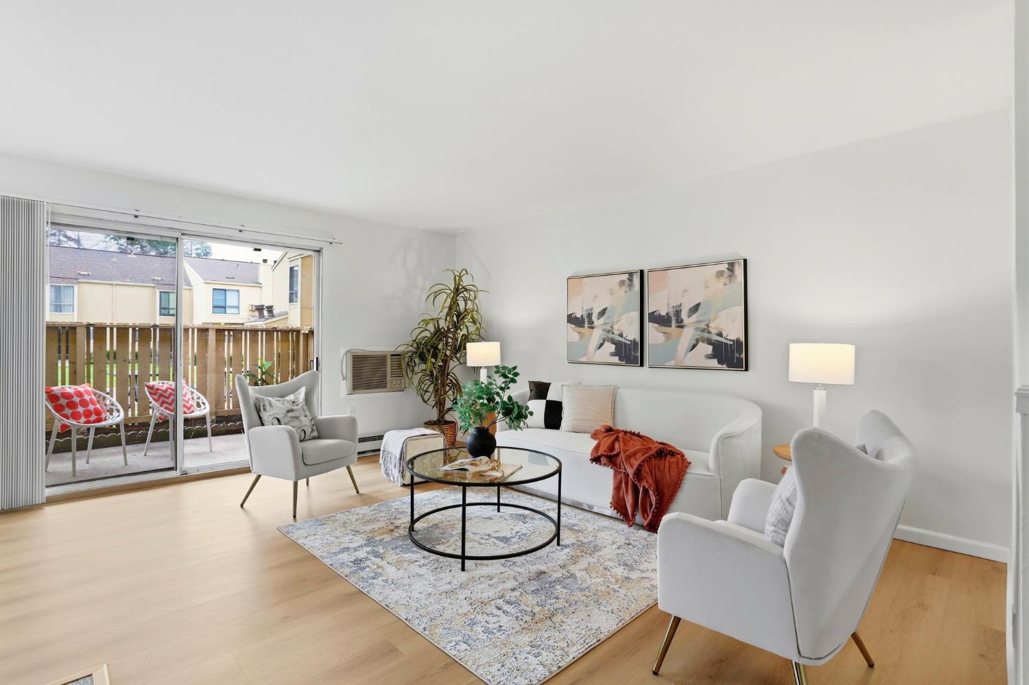9005 Alcosta Boulevard, Unit 215 San Ramon, CA 94583 - Photo 5 of 30 a living room with furniture and wooden floor