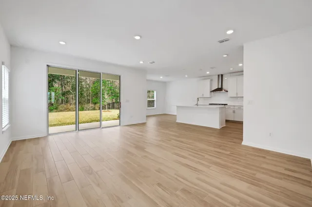 a house view with a backyard space