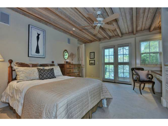 15670 Peach Hill Road Saratoga, CA 95070 - Photo 15 of 25 a bedroom with a large bed and a window