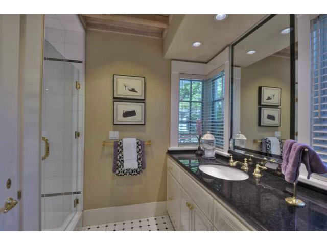 15670 Peach Hill Road Saratoga, CA 95070 - Photo 16 of 25 a bathroom with a sink and mirror